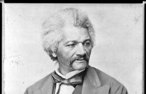  A portrait of Frederick Douglass, head-and-shoulders portrait, facing right.