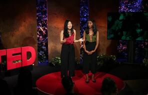 Priya Vulchi and Winona Gao give a TED talk.