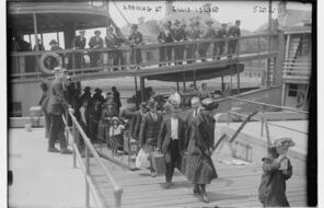 Immigrants arriving at Ellis Island.