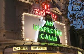 An Inspector Calls sign at the Playhouse in London