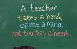 A Teacher Takes A Hand, Opens A Mind, And Touches A Heart