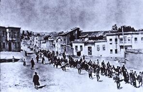 Armenians are marched to a nearby prison in Mezireh by Ottoman soldiers. Harput (Kharpert), Elazığ Province, Ottoman Empire, April, 1915