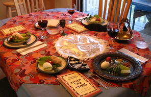  Passover Seder Table with food on plates
