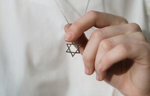 Person Holding a Star of David
