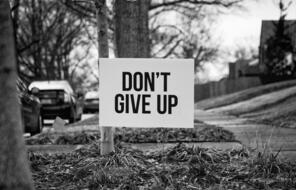 "Don't Give Up" yard sign