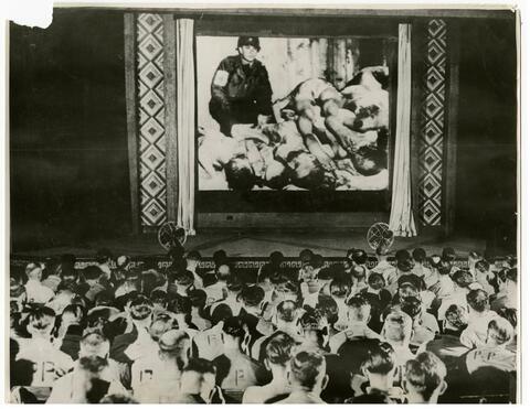 German soldiers are forced by the Allies after World War II to watch a film about the atrocities at German concentration camps.