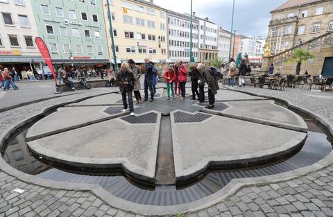 In Kassel, Germany, artist Horst Hoheisel created a “counter-memorial” marking the site where a majestic fountain built by a Jewish citizen once stood; it had been destroyed by Nazis in 1939.