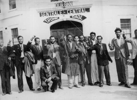 A group of resisters proudly pose after their release from prison in Durban during the Defiance Campaign Against Unjust Laws, 1952.