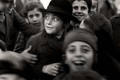 Several Jewish schoolchildren jostle each other. Taken circa 1935-1938.