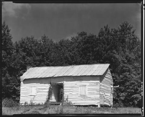 A cabin where an African American family lived, in rural  Hale County, Alabama during the Great Depression.