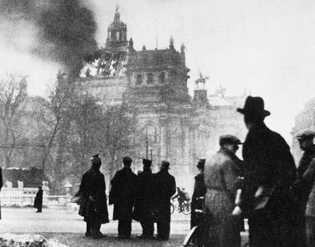 Germans look on as the Reichstag building burns on February 27, 1933.