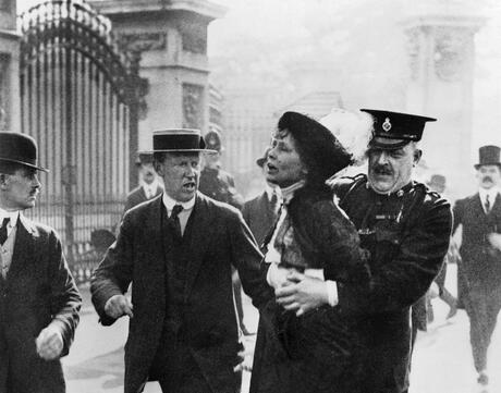 The leader of the Women's Suffragette movement, Mrs Emmeline Pankhurst is arrested by Superintendent Rolfe outside Buckingham Palace, London while trying to present a petition to HM King George V in May 1914.