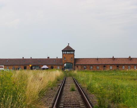 Color photograph of the Auschwitz-Birkenau Museum Gate From The Outside 