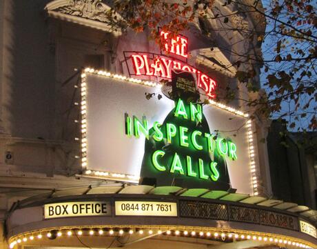 An Inspector Calls sign at the Playhouse in London