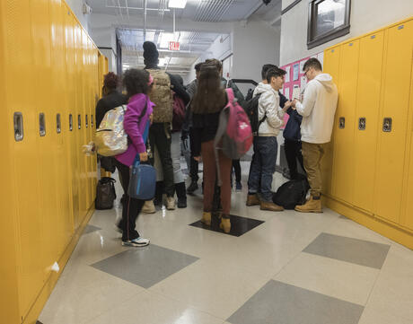 Urban high school students in hallway